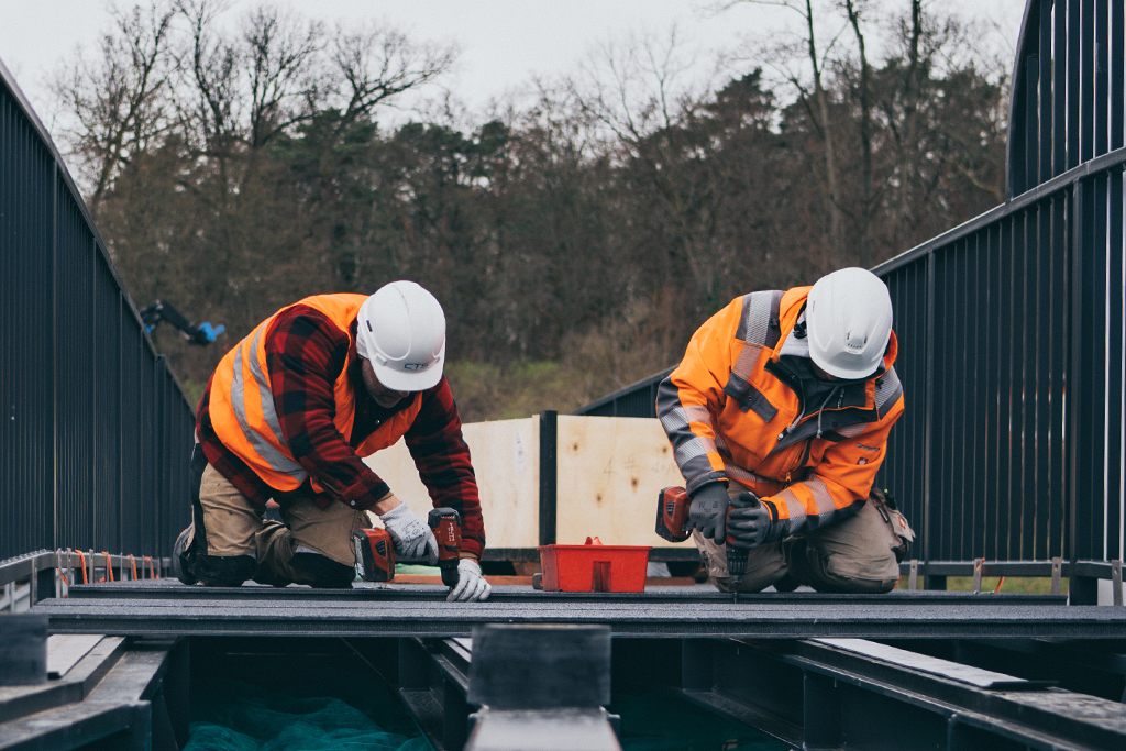 The team assembles a GRP structure